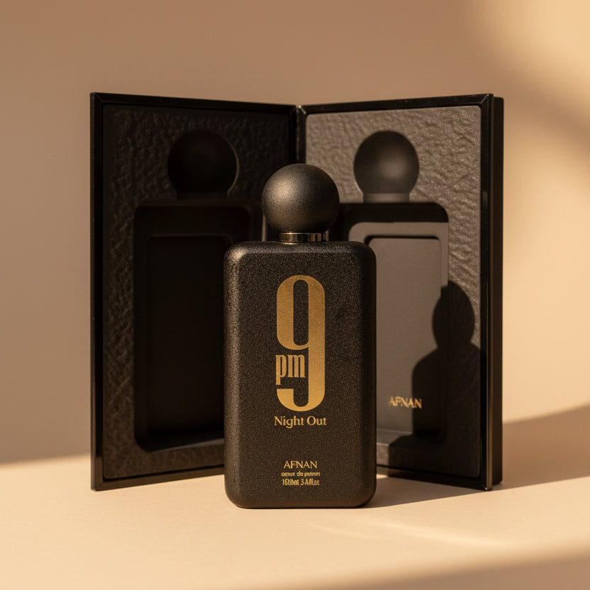 Perfume bottle labeled '9 pm Night Out' by Afnan in a black box on a white background