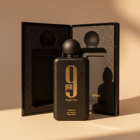 Perfume bottle labeled '9 pm Night Out' by Afnan in a black box on a white background